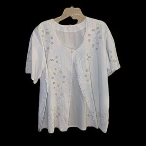 White cotton blouse with cut-out lace pattern